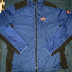 Helly Hansen, jacket size Xl, blue and black, lightly padded. Brand new,